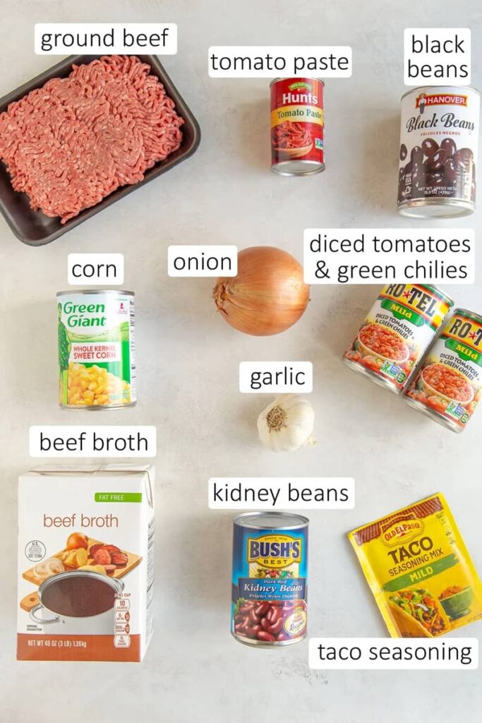 image of some Ingredients garlic, corn can diced tomatoes and green chilies, etc. of Taco soup with Frios on the floor 