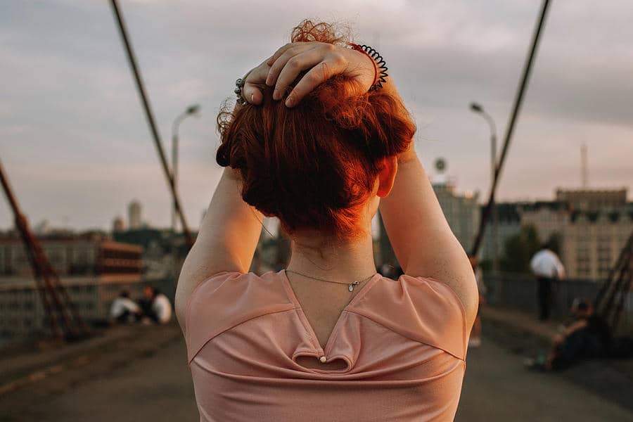 Image of Girl Holding that hair due to Hairwalk Punishment